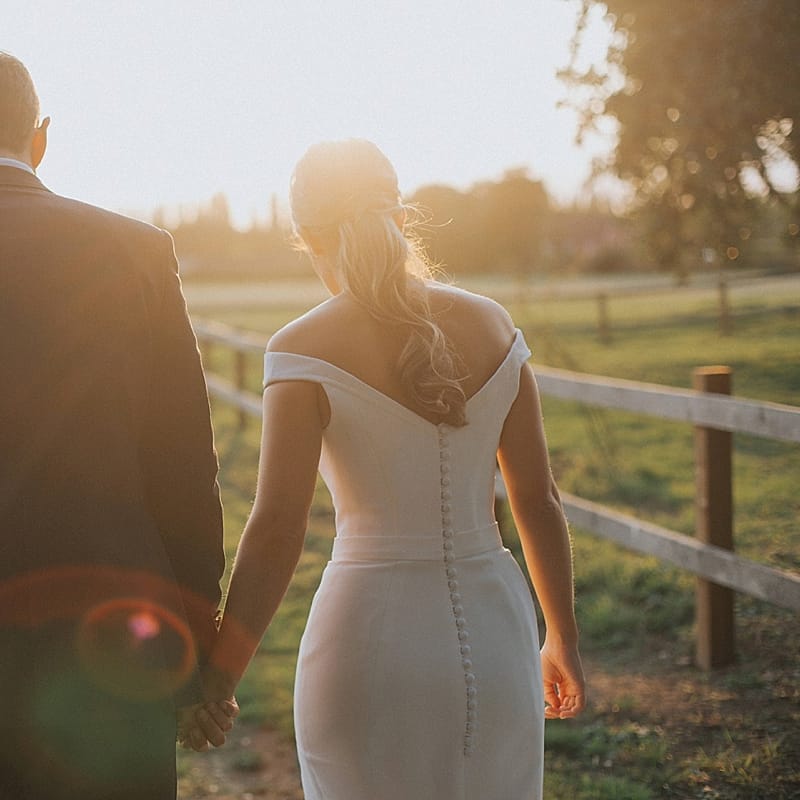 Golden Hour Portrait | Bride in Suzanne Neville Bardot Nouveau Wedding Dress | Groom in Black Tie | Pastel Pink &amp; Mint Green Wedding at Granary Estates Suffolk | Julia &amp; You Photography