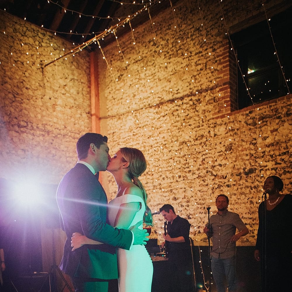 First Dance | Bride in Suzanne Neville Bardot Nouveau Wedding Dress | Groom in Black Tie | Pastel Pink &amp; Mint Green Wedding at Granary Estates Suffolk | Julia &amp; You Photography