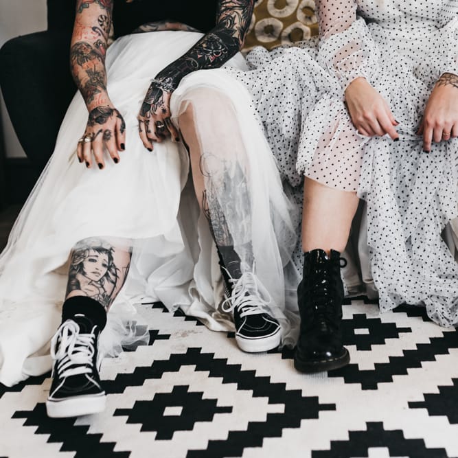 Black and white bridal boots and trainer wedding shoes