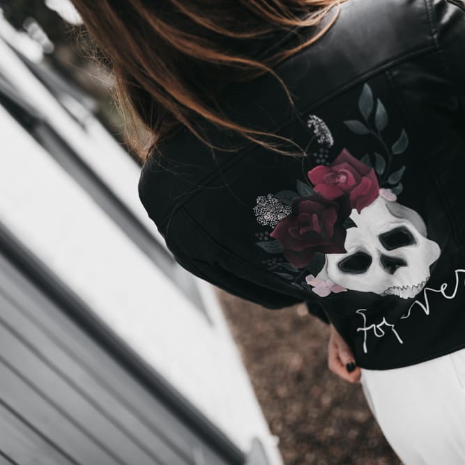 Leather jacket with skull print on the back