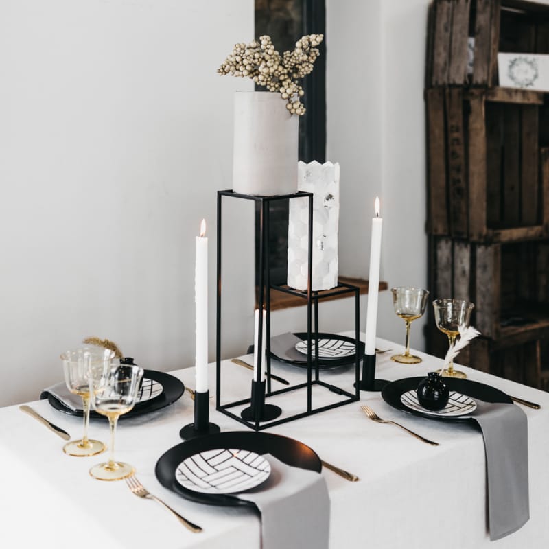 Tall wedding cakes on black stands
