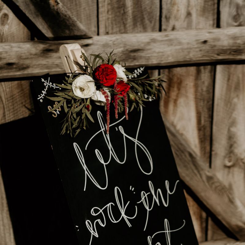 Black Wedding Sign with Floral Decor