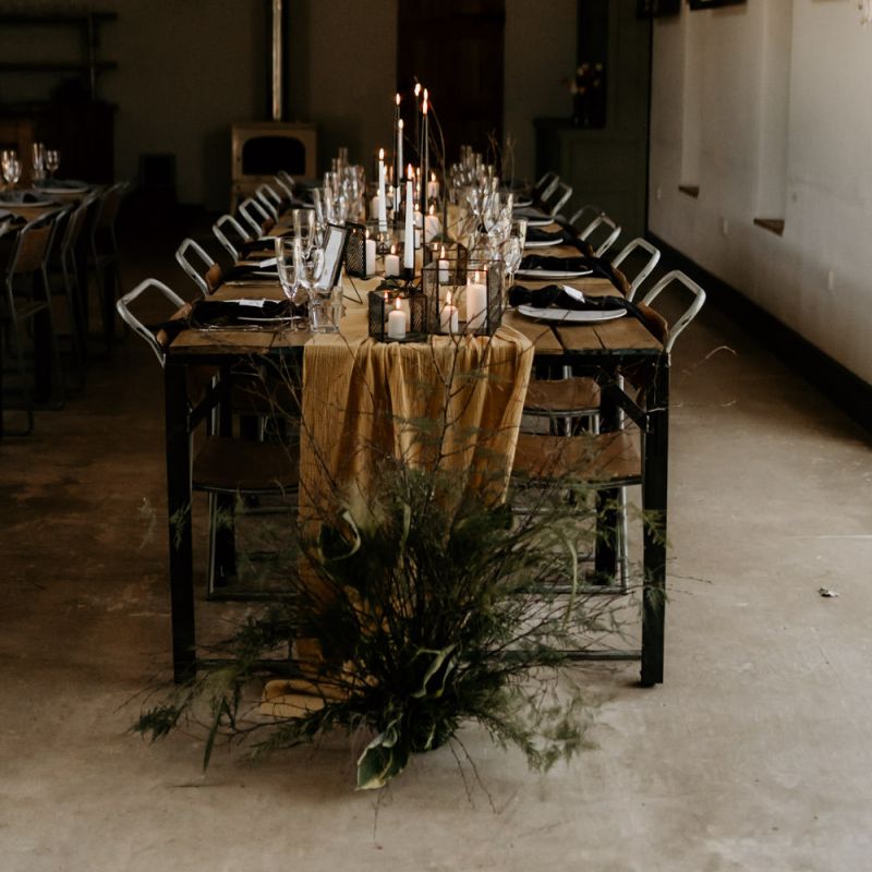 Elegant Table Decoration with Taper Candles, Tapper Candles and Foliage