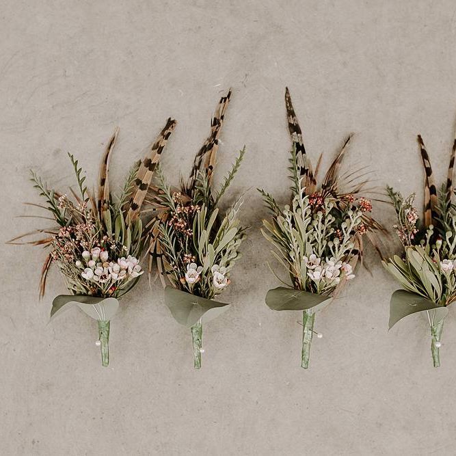 Wedding buttonholes to match Protea bouquet