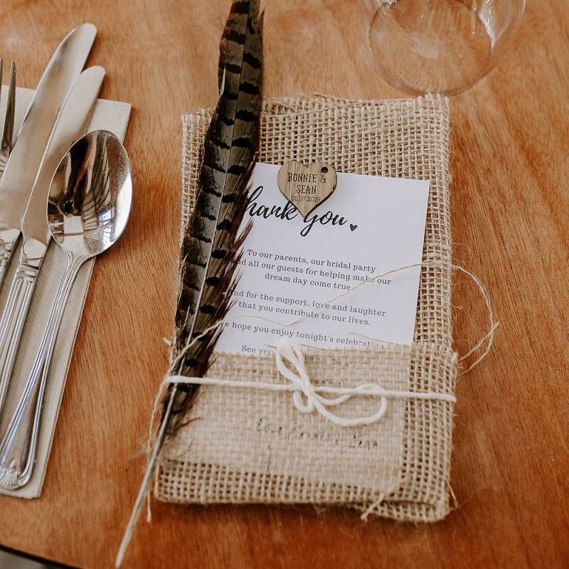 Feather detail wedding place setting
