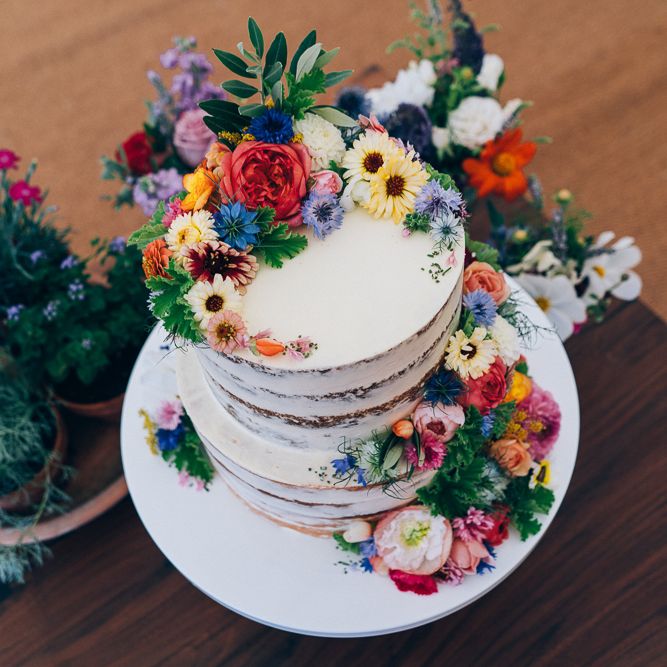 Naked Wedding Cake With Wild Flower Decor // Images By Casey Avenue Photography