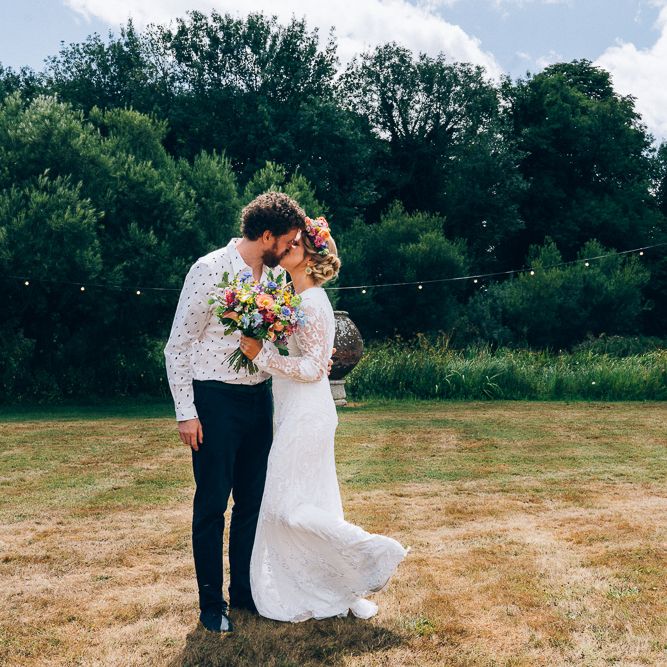 Bride In Brightly Colour Flower Crown // Image By Casey Avenue Photography