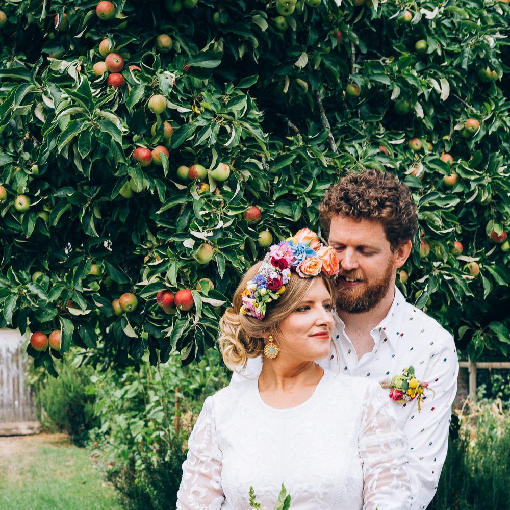 Bride In Brightly Colour Flower Crown // Image By Casey Avenue Photography