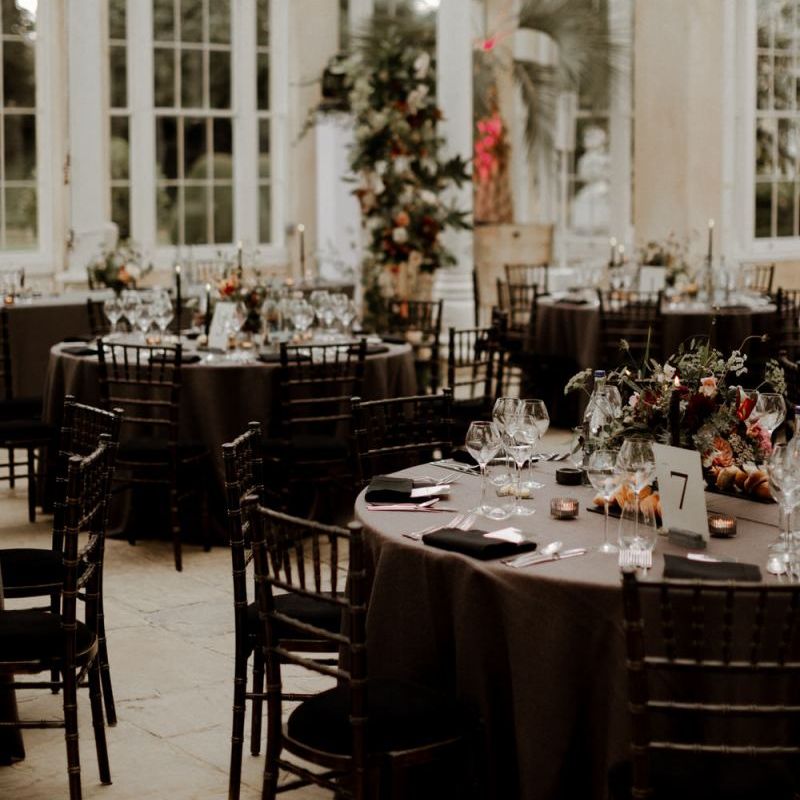 Black wedding reception table cloths and chairs at Syon park wedding