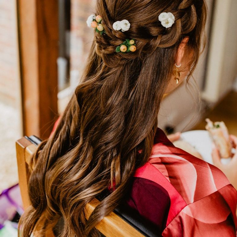 Brides half up half down hair with flowers