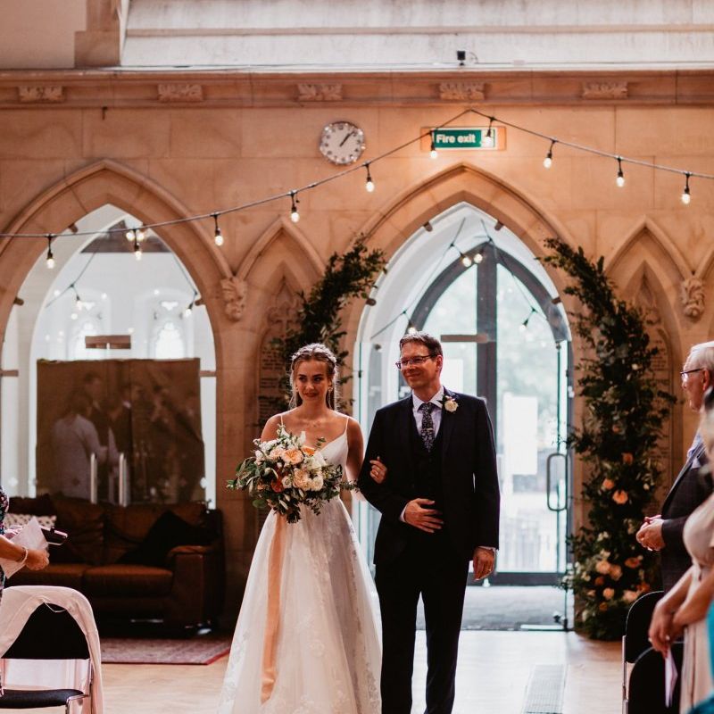 church wedding ceremony bridal entrance in Essense of Australia wedding dress