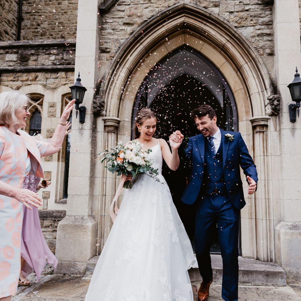 Bride and groom church confetti exit at 2020 wedding
