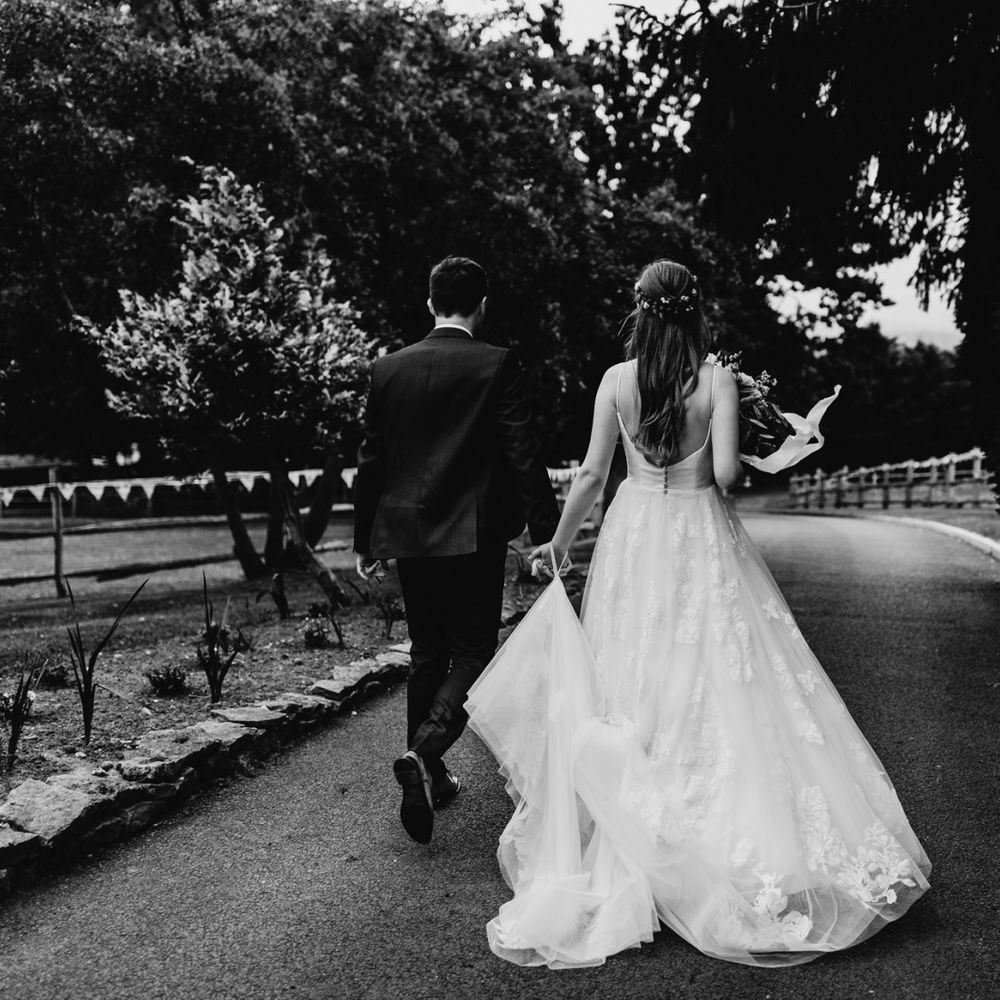 Bride in Essense of Australia wedding dress with lace detail