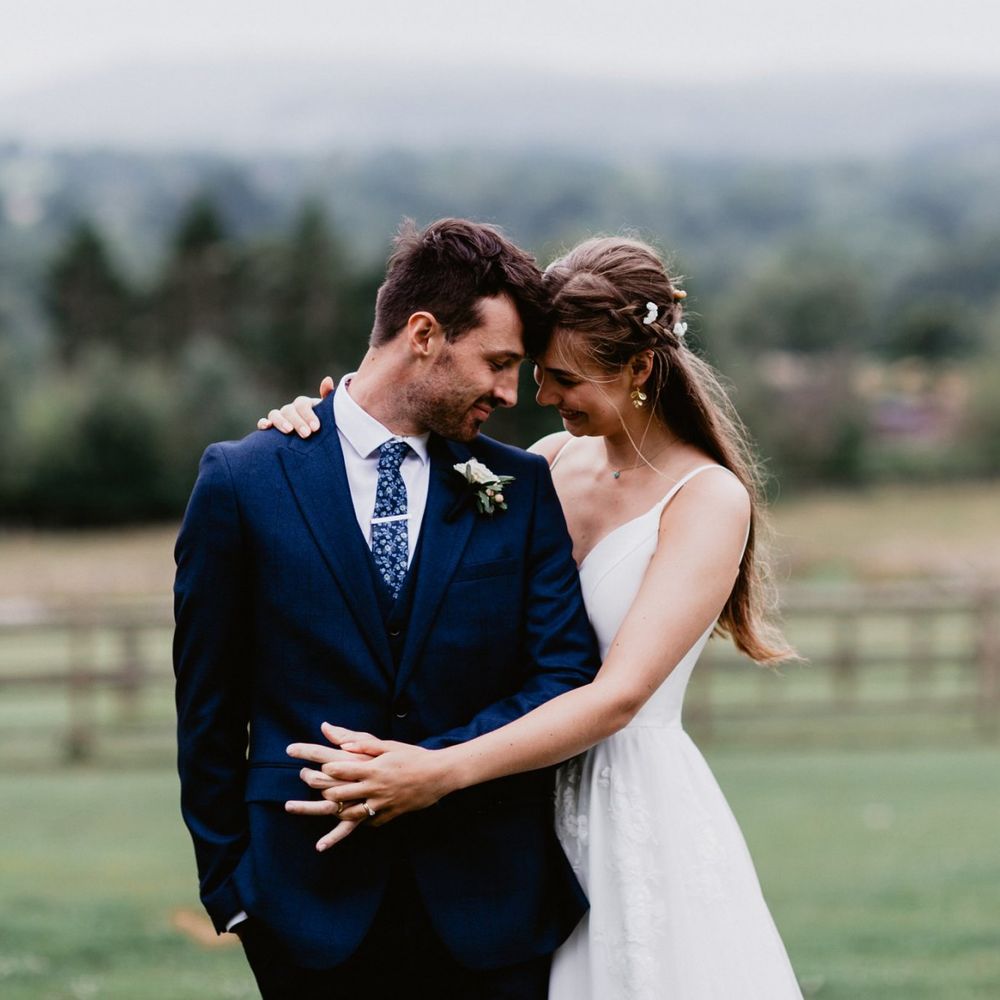Bride hugging her groom