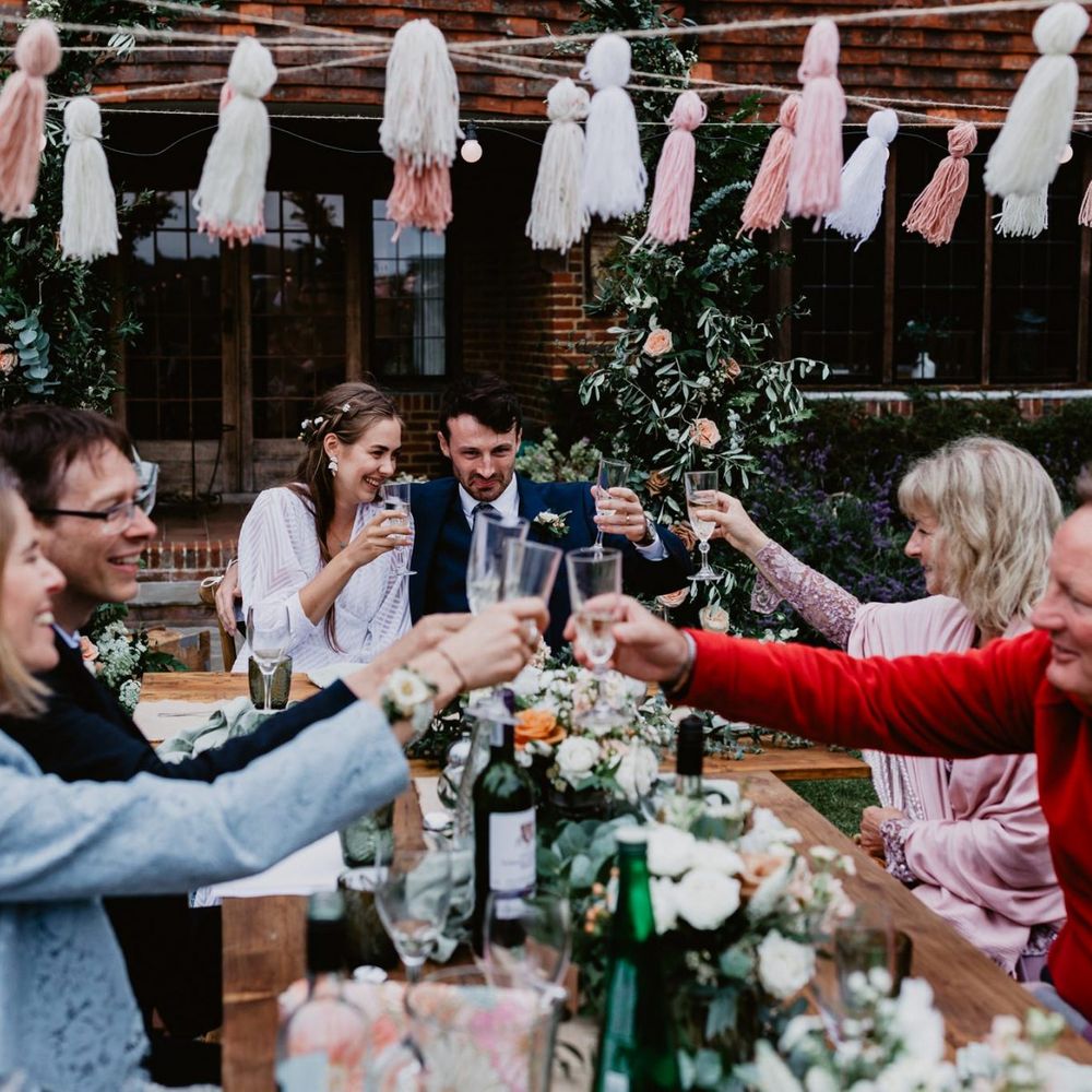 Wedding guests toast at 2020 wedding