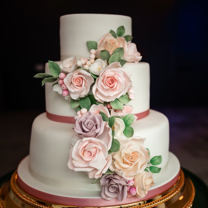 Romantic Royal Icing Wedding Cake with Cascading Rose Decor