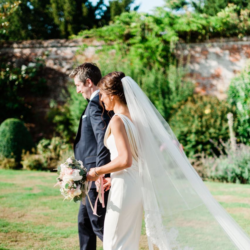 Lace trim veil for bride with updo