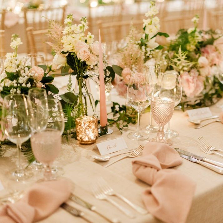 Pink napkins and flowers for Four Seasons Hampshire wedding breakfast