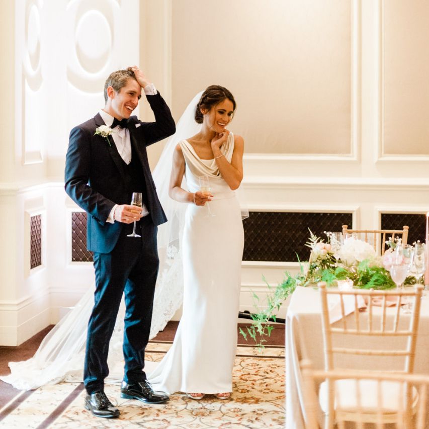 Bride and groom enter the room