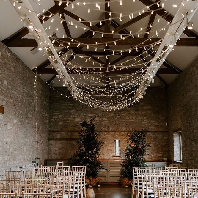 Fairy light canopy for barn wedding