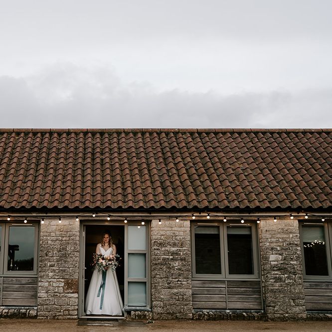 Bride makes her way to the wedding ceremony at Bristol venue