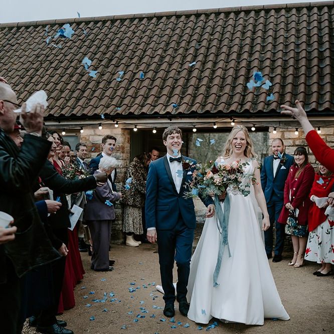 Confetti exit bride and groom