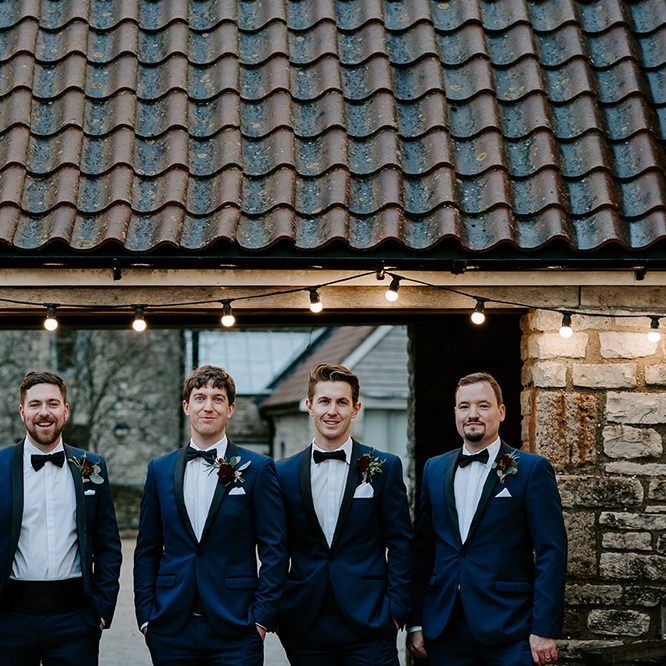 Groomsmen in matching tuxedos for December wedding in Bristol