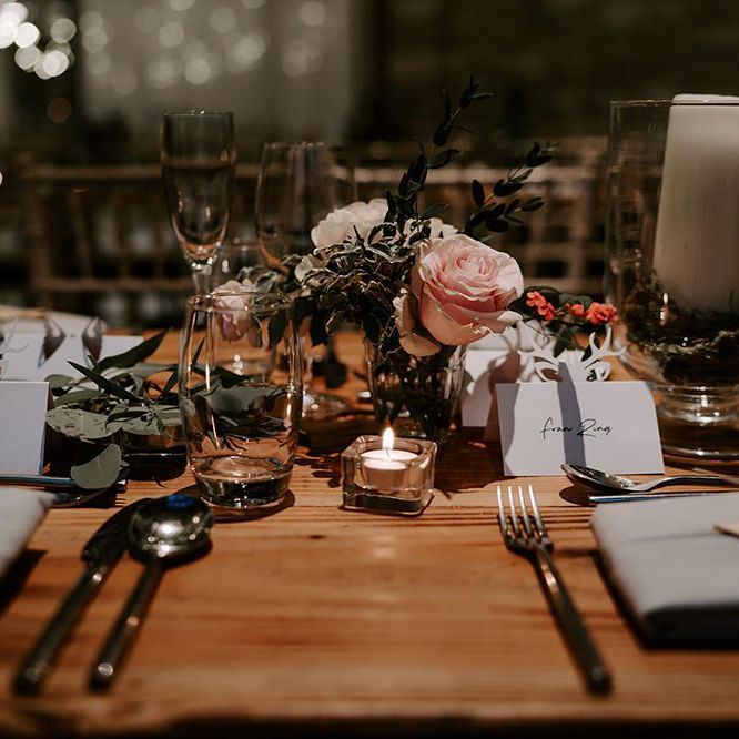 Wedding table decor with flowers and candles