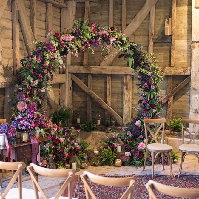 Purple, Plum, Aubergine and Berry Flower Moon Gate in a Rustic Barn