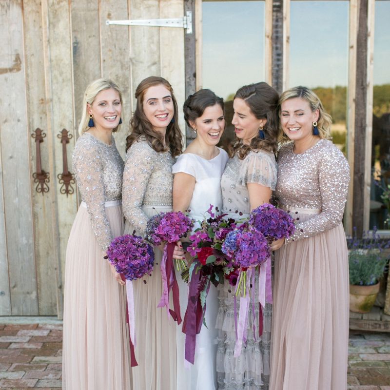 Bridal Party with Bridesmaids in Needle &amp; Thread Dresses and Bride in Jesus Peiro Wedding Dress