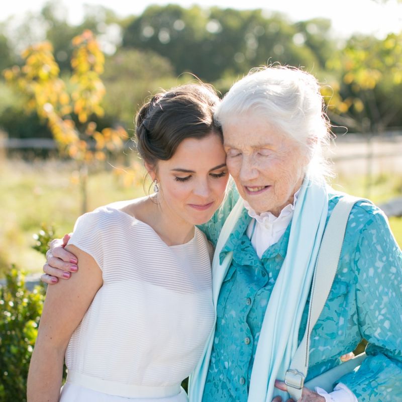 Bride in Jesus Peiro Wedding Dress Hugging Her  Grandmother