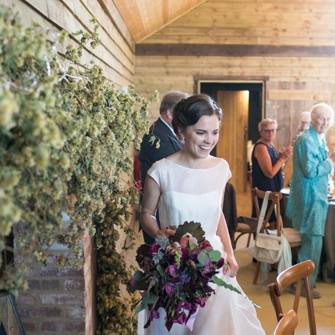 Bride Entering The Wedding Breakfast in a Jesus Peiro Wedding Dress