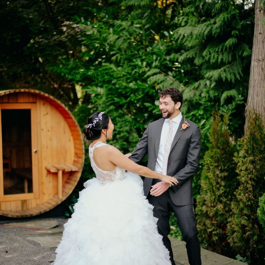 Bride in layered tulle skirt at first look