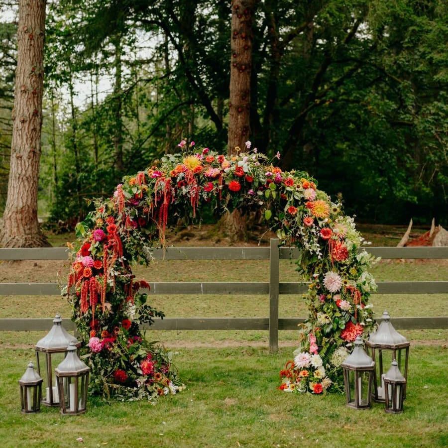 Flower arch, moon gate, altar with lanterns