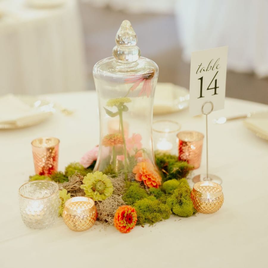 Moss centrepiece with apothecary jar and votives