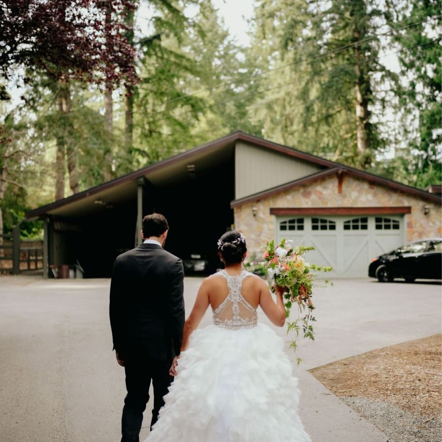 Bride in preloved racerback wedding dress and frou frou skirt