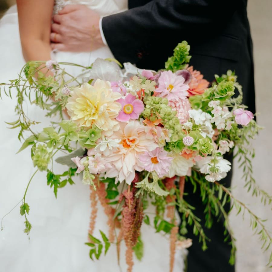 Romantic handpicked wedding bouquet with dahlias