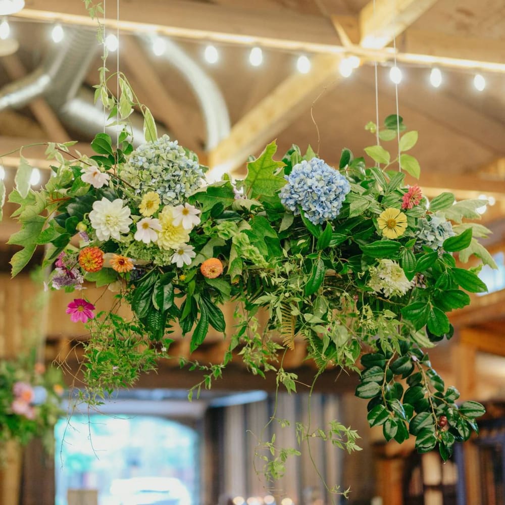 Hanging flower installation with homegrown flowers
