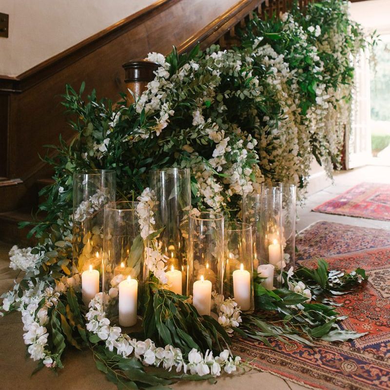 White Flower and Foliage Staircase Flowers with Candles
