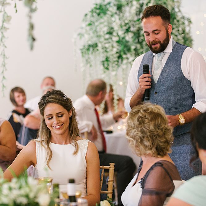 Groom in Grey Wool Waistcoat Giving His Wedding Speech