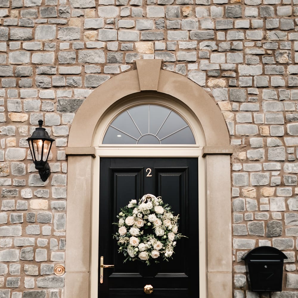 White &amp; Green Floral Door Wreath | Elegant Grey, Green, White &amp; Gold Black Tie, Marquee Wedding at Tullyveery House N. Ireland with Decor &amp; Styling by Mood Events | The Lou's Photography | Soul &amp; Rise Film