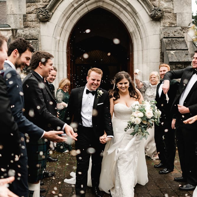 Confetti Exit | Bride in Badgley Mischka  Lace Bridal Gown | Groom in Black Tie | Elegant Grey, Green, White &amp; Gold Black Tie, Marquee Wedding at Tullyveery House N. Ireland with Decor &amp; Styling by Mood Events | The Lou's Photography | Soul &amp; Rise Film