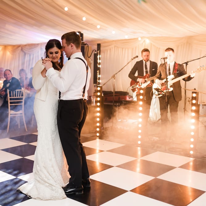 First Dance | Bride in Badgley Mischka  Lace Bridal Gown | Groom in Black Tie | Elegant Grey, Green, White &amp; Gold Black Tie, Marquee Wedding at Tullyveery House N. Ireland with Decor &amp; Styling by Mood Events | The Lou's Photography | Soul &amp; Rise Film
