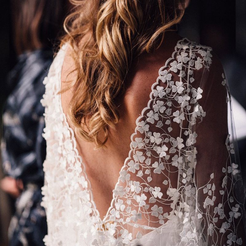 Appliqué wedding dress with hair down