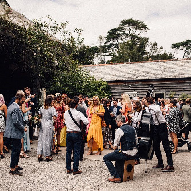 Guests enjoy drinks outside