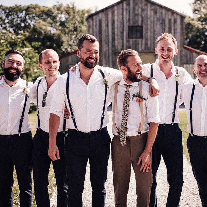 Groomsmen in matching outfits with braces