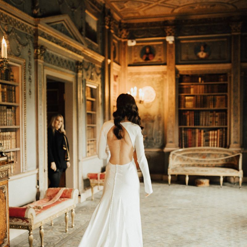 Bride in Homemade Wedding Dress with Backless Detail