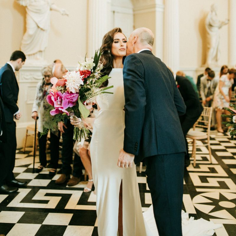 Father of The Bride Kissing His Daughter at the Altar