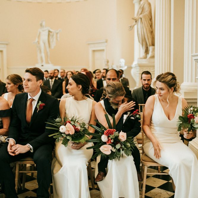 Bridesmaids in White Dresses During The Wedding Ceremony