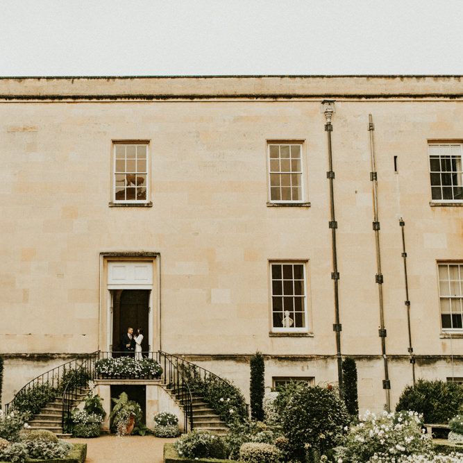 Bride and Groom Portrait Standing at the Top of Syon Park Steps